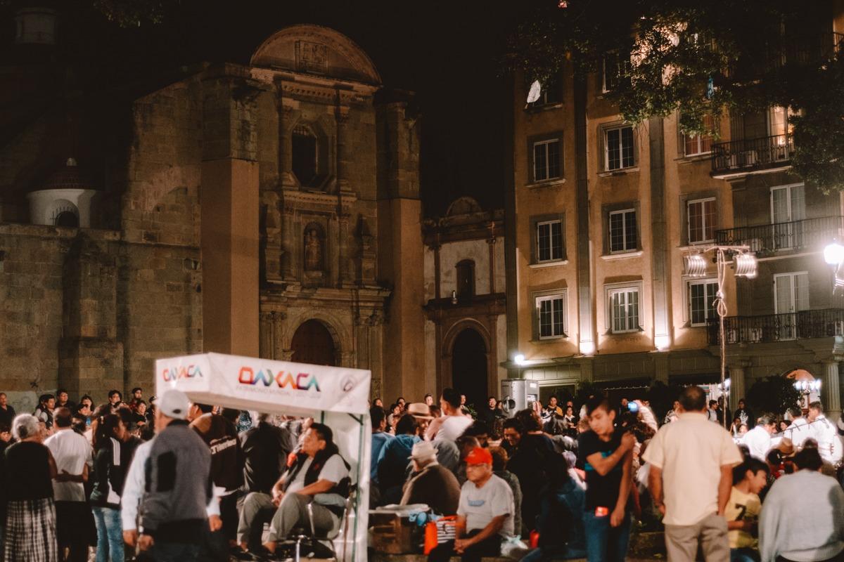 Crowds of people at Zocalo at night (what to do in Oaxaca suggestion)