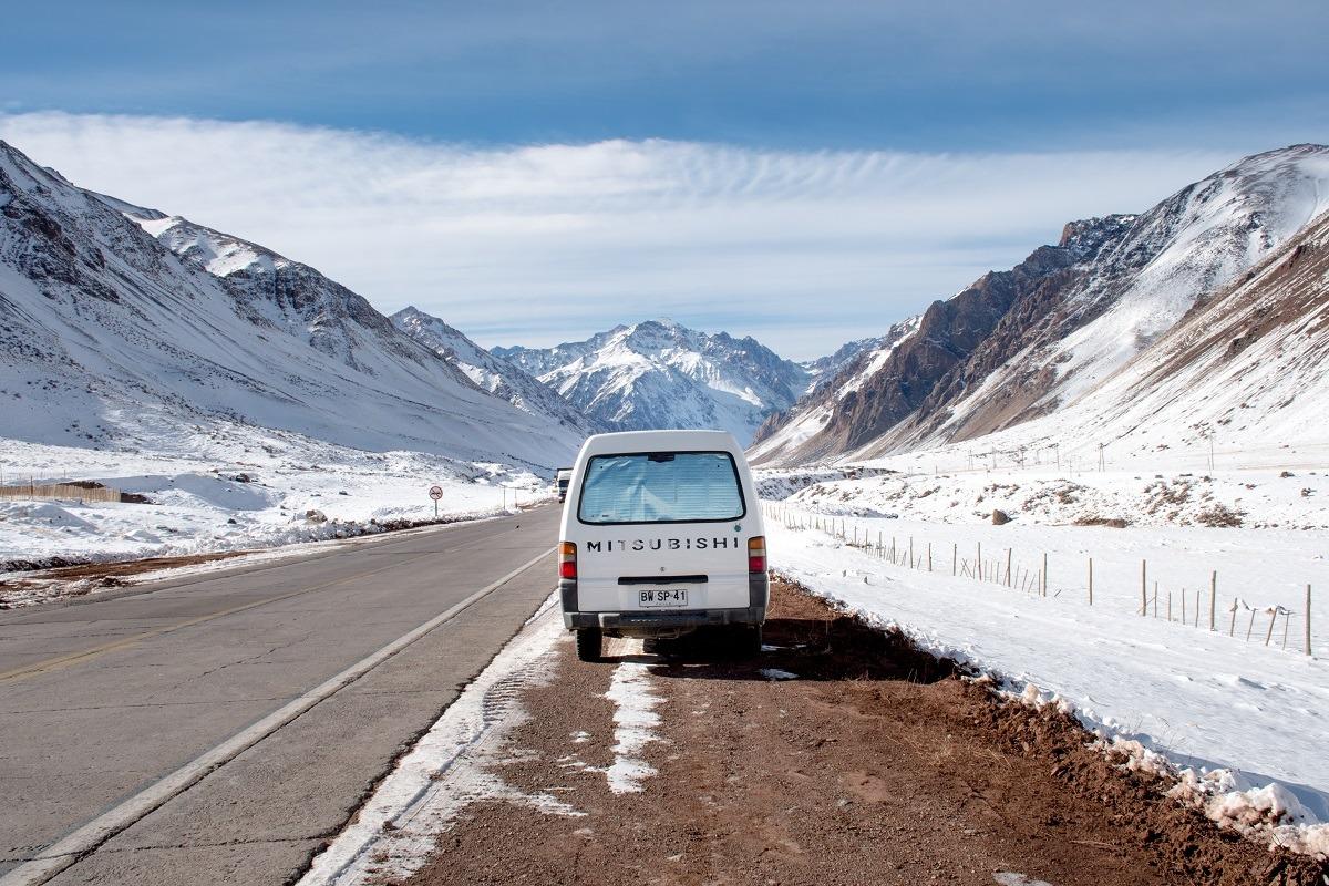 Van in a snowy environment of Andes border crossing