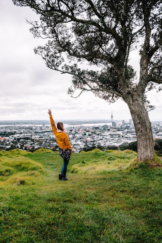 Me (Sandra) on the top of Mt Eden - city and SkyTower in the distance