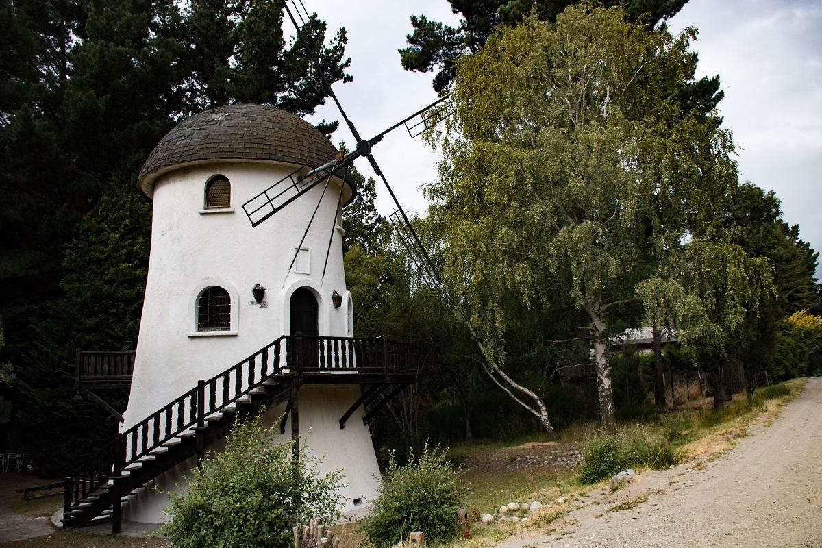 White windmill by the street (Unique towns in Patagonia)