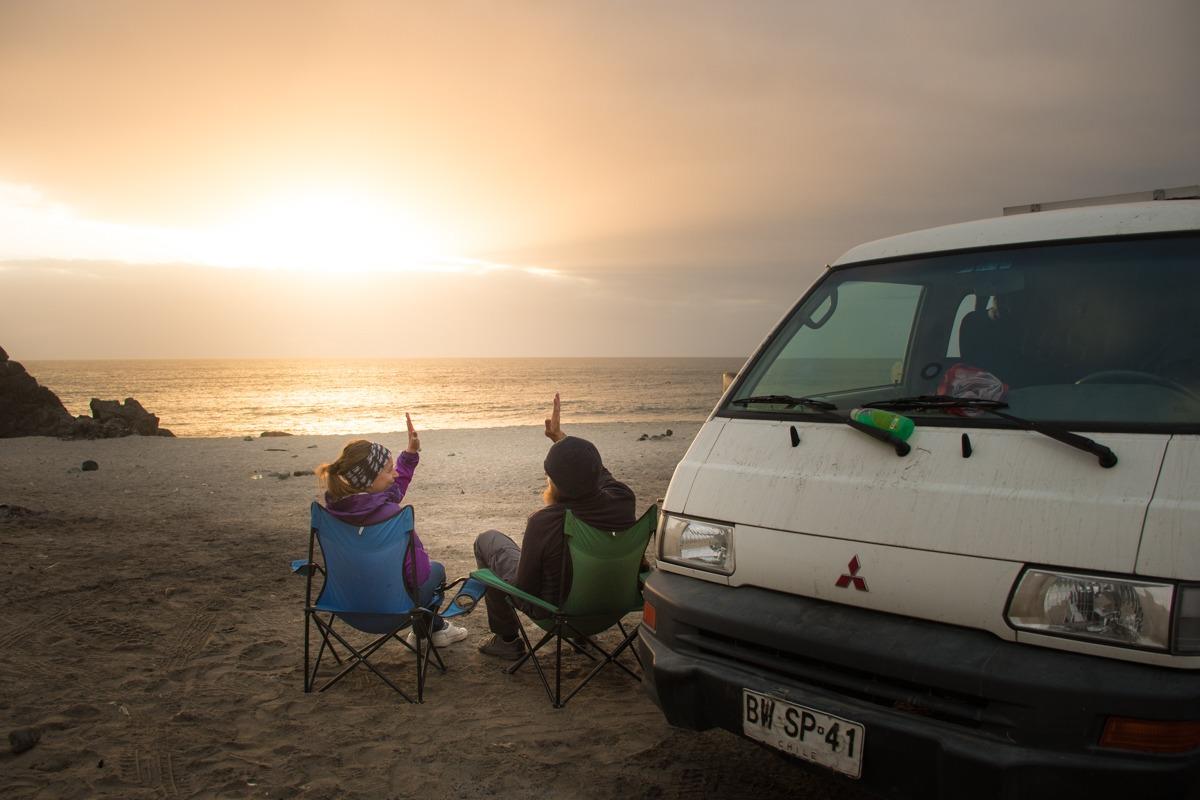 Us & Pisco By the Pacific coast at sunset (our yearlong honeymoon)