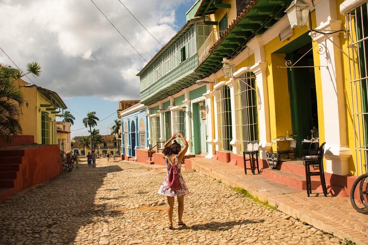 A girl on colorful streets of Trinidad, Cuba