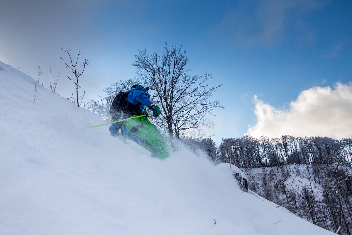 A guy freeride skiing in Slovenia (one of the top outdoor adventures around here!)